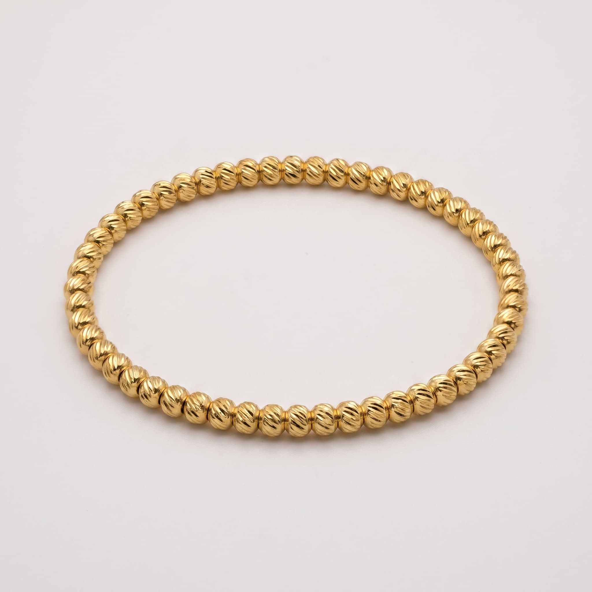 textured gold bead bangle