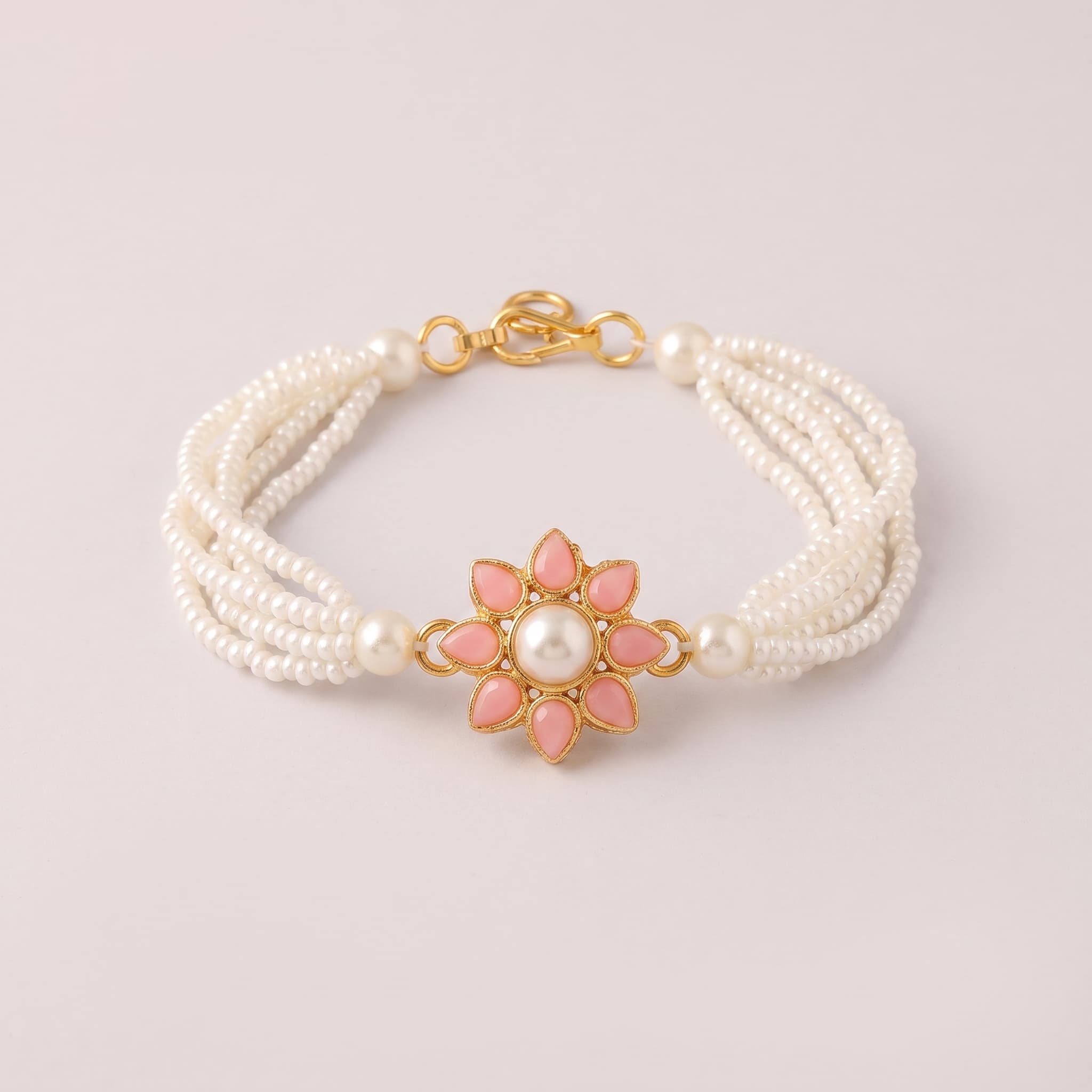 pink floral pearl beaded Rakhi