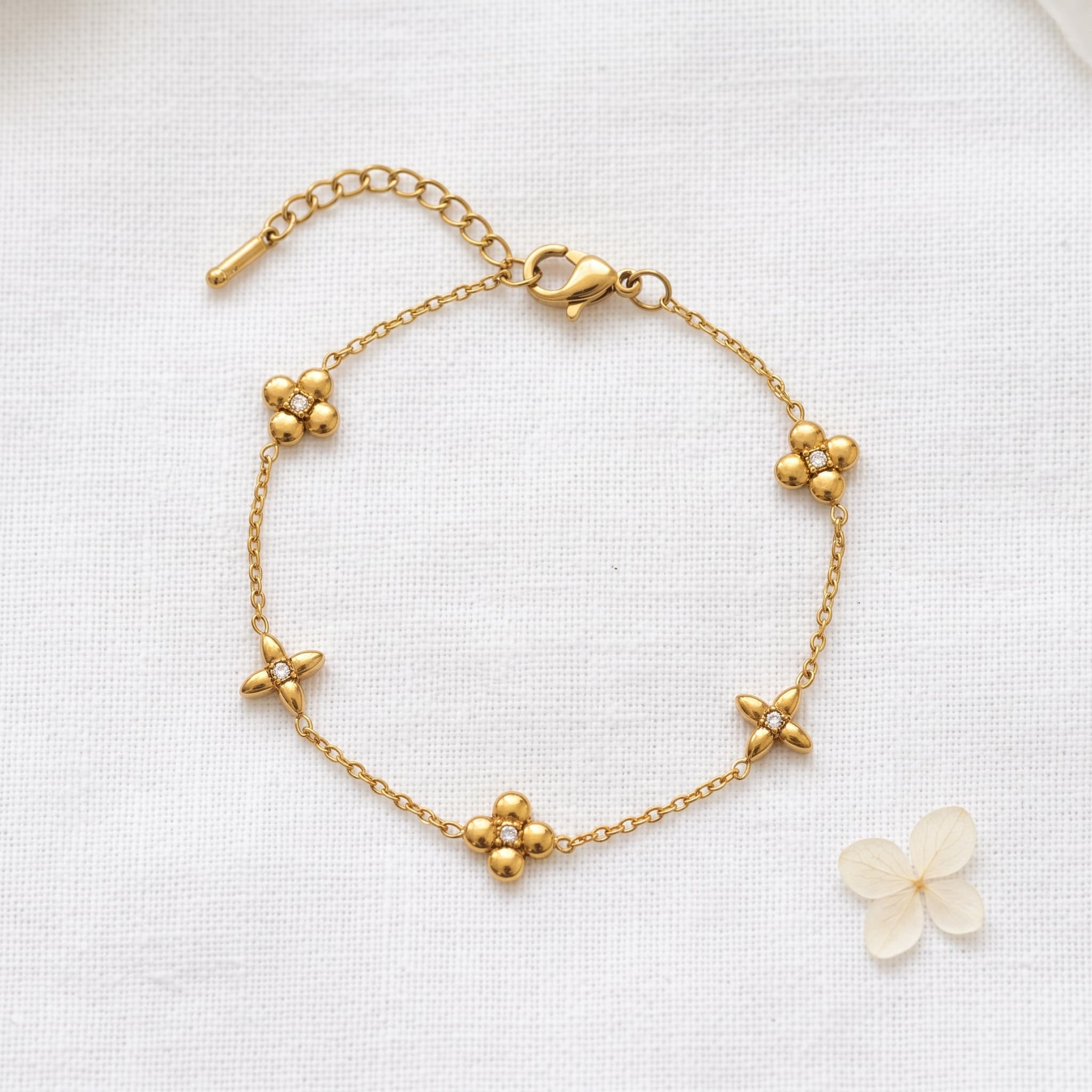 dainty gold floral charm bracelet
