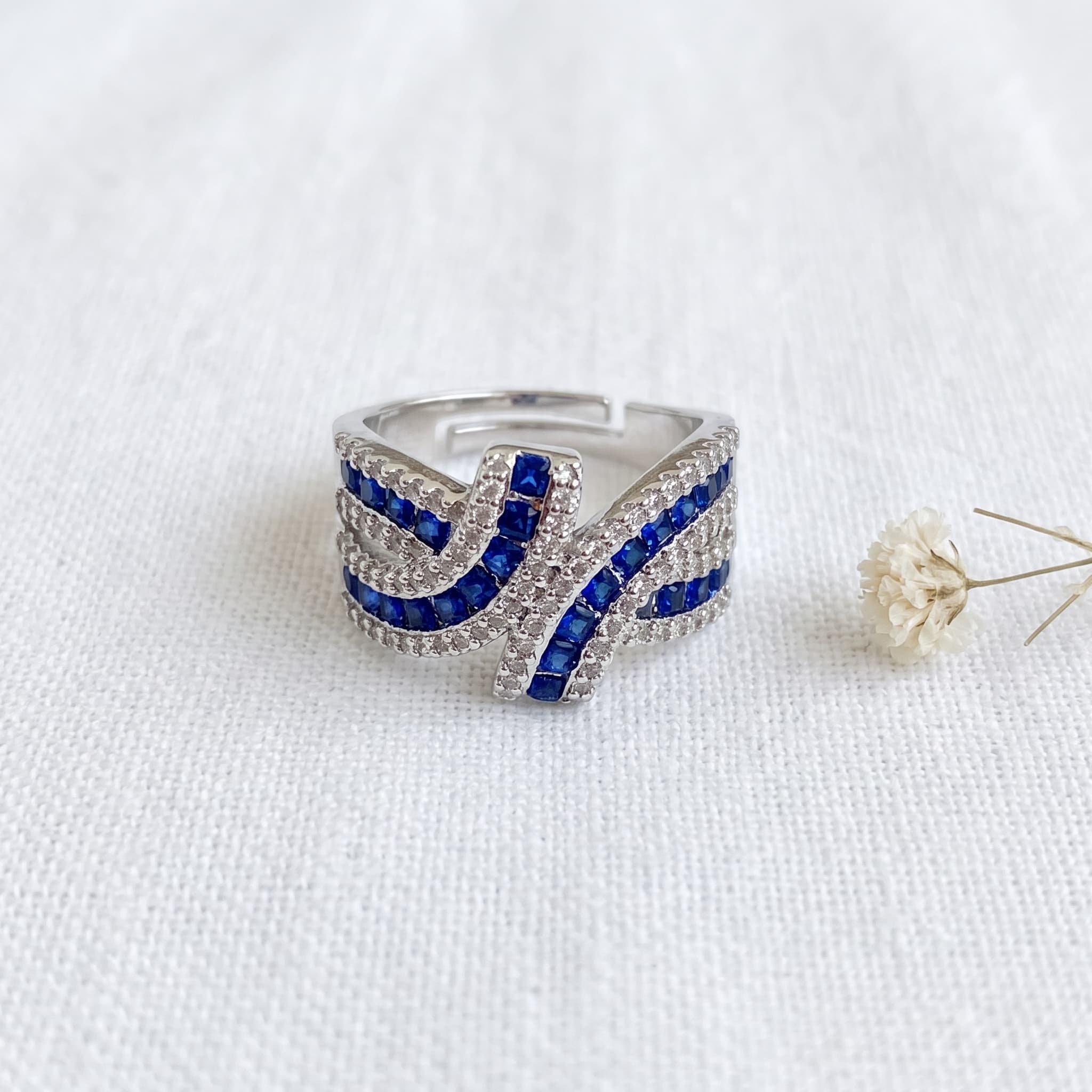 blue sapphire swirl adjustable ring
