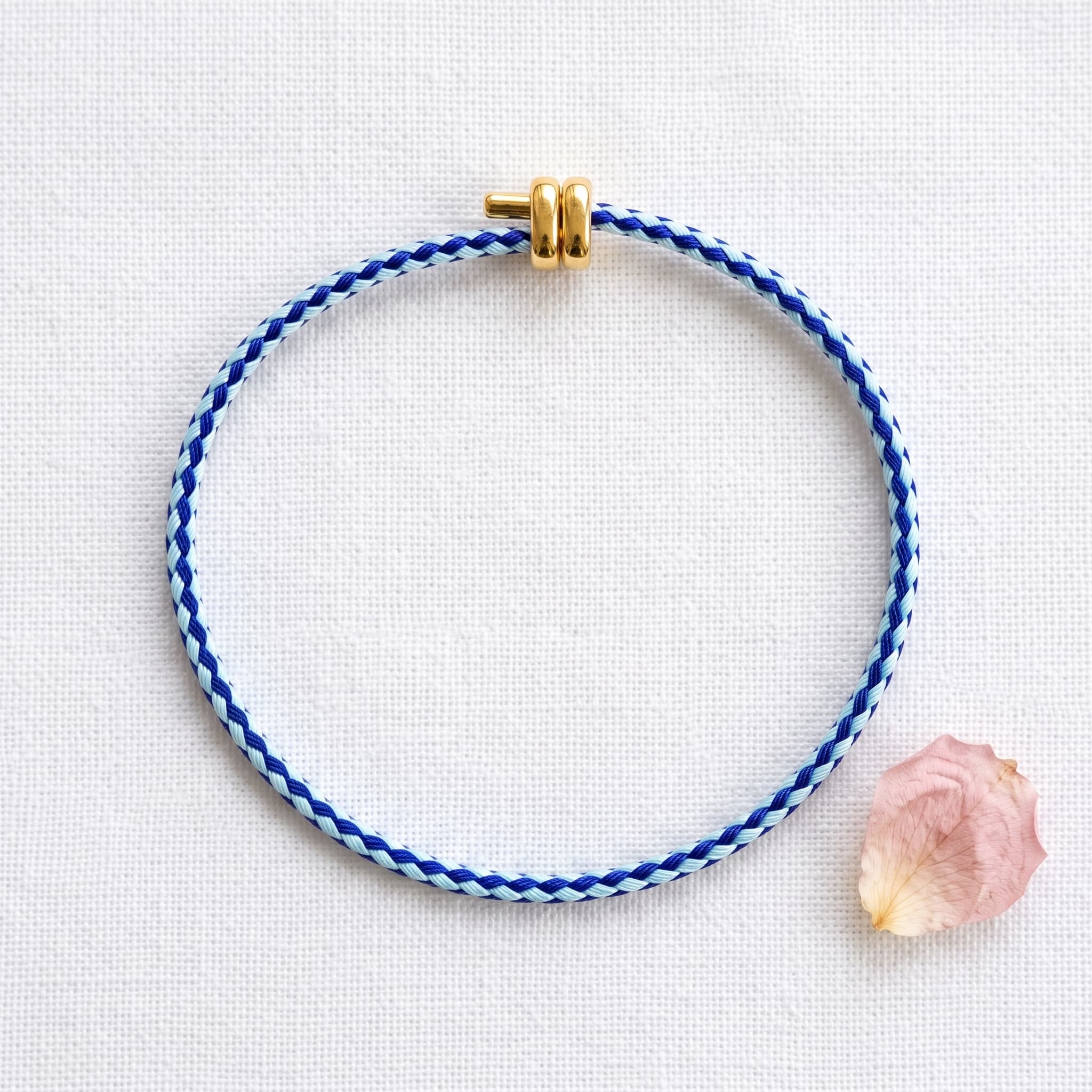 blue braided cord bracelet
