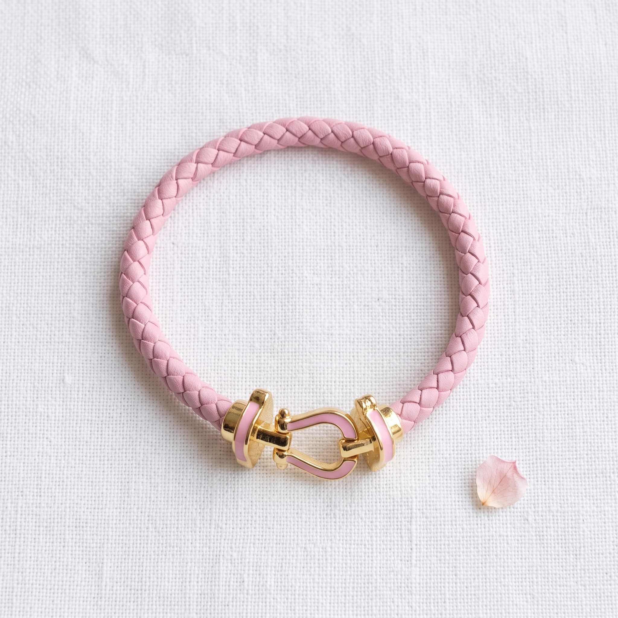 braided pink horseshoe bracelet