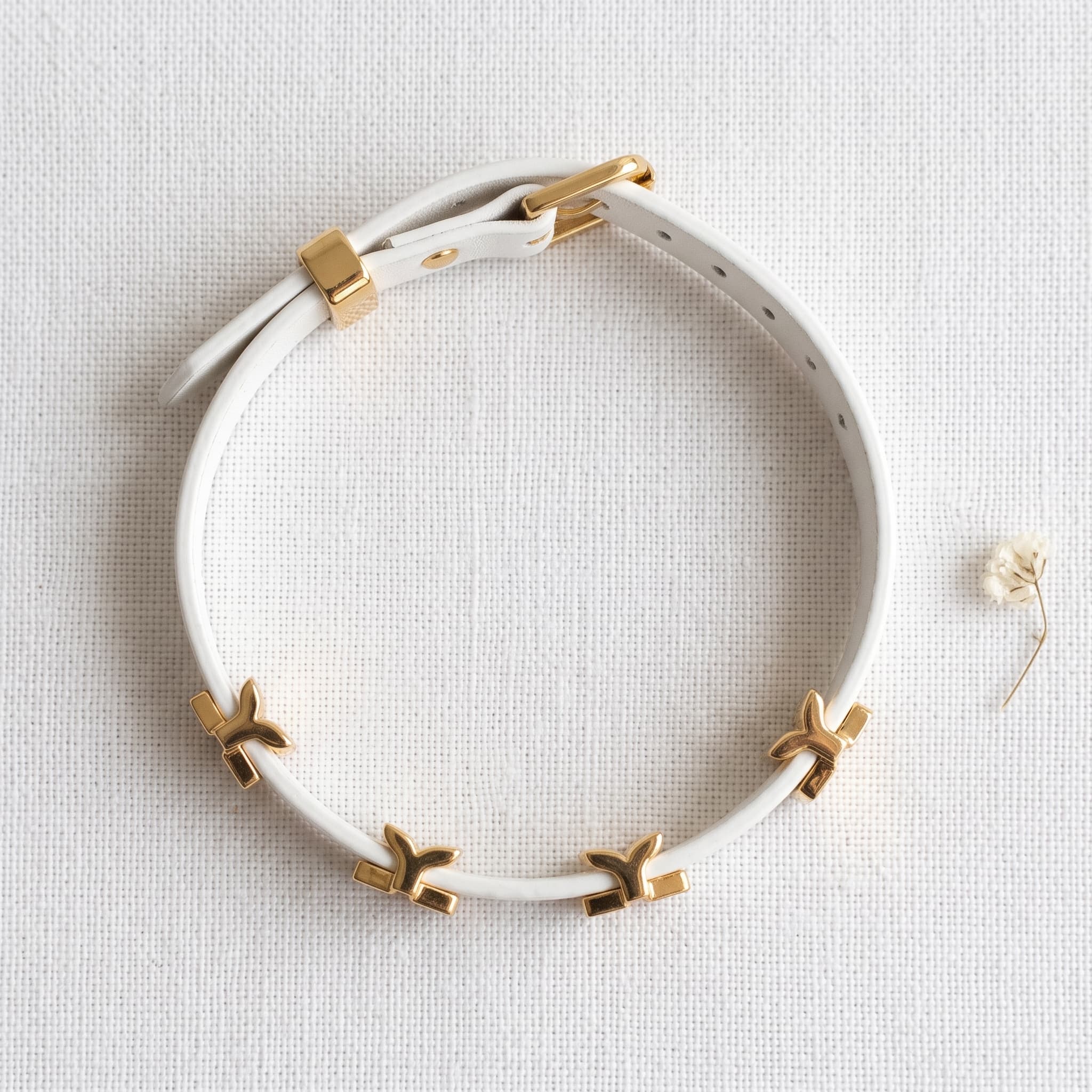 white leather golden buckle charm bracelet