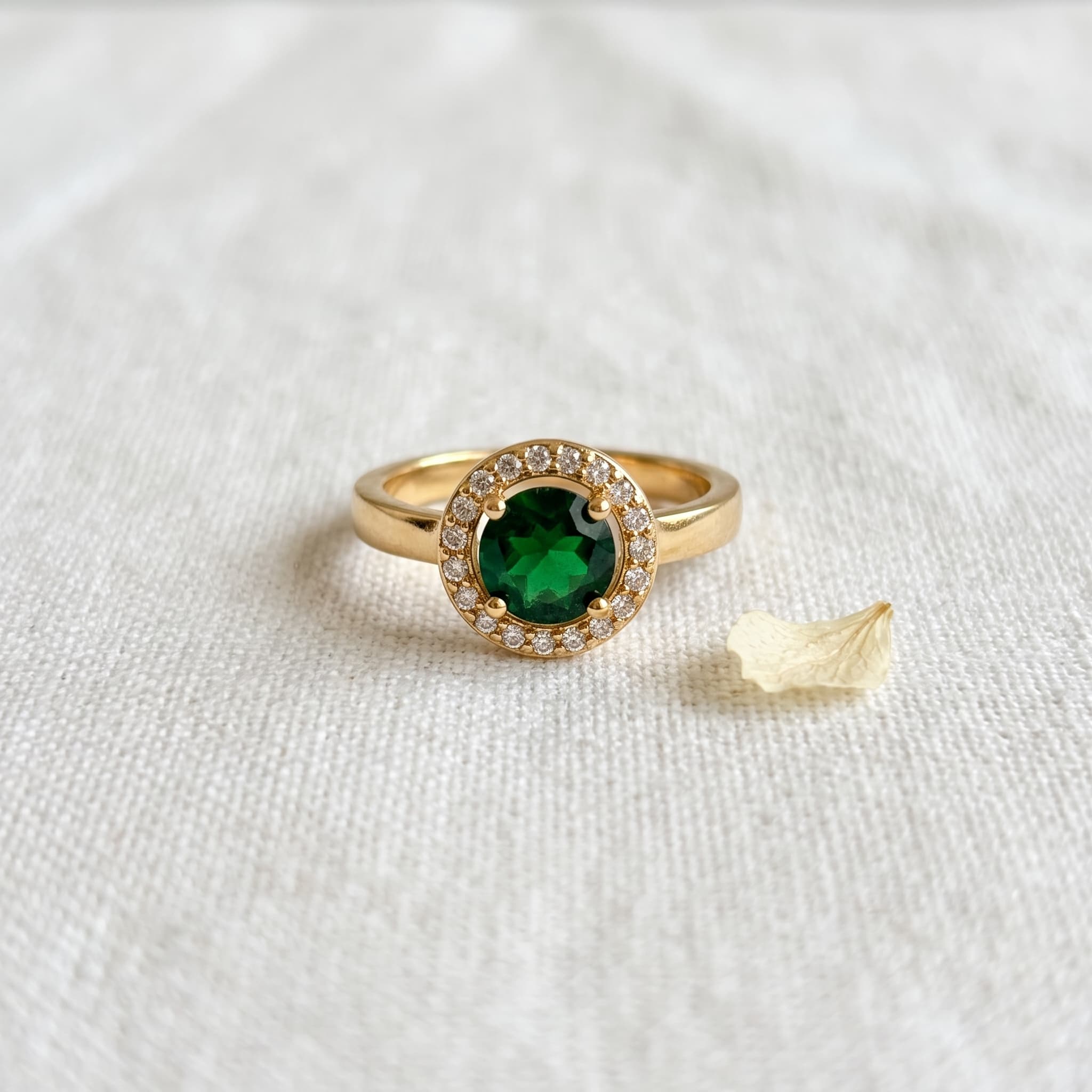 emerald halo gold ring