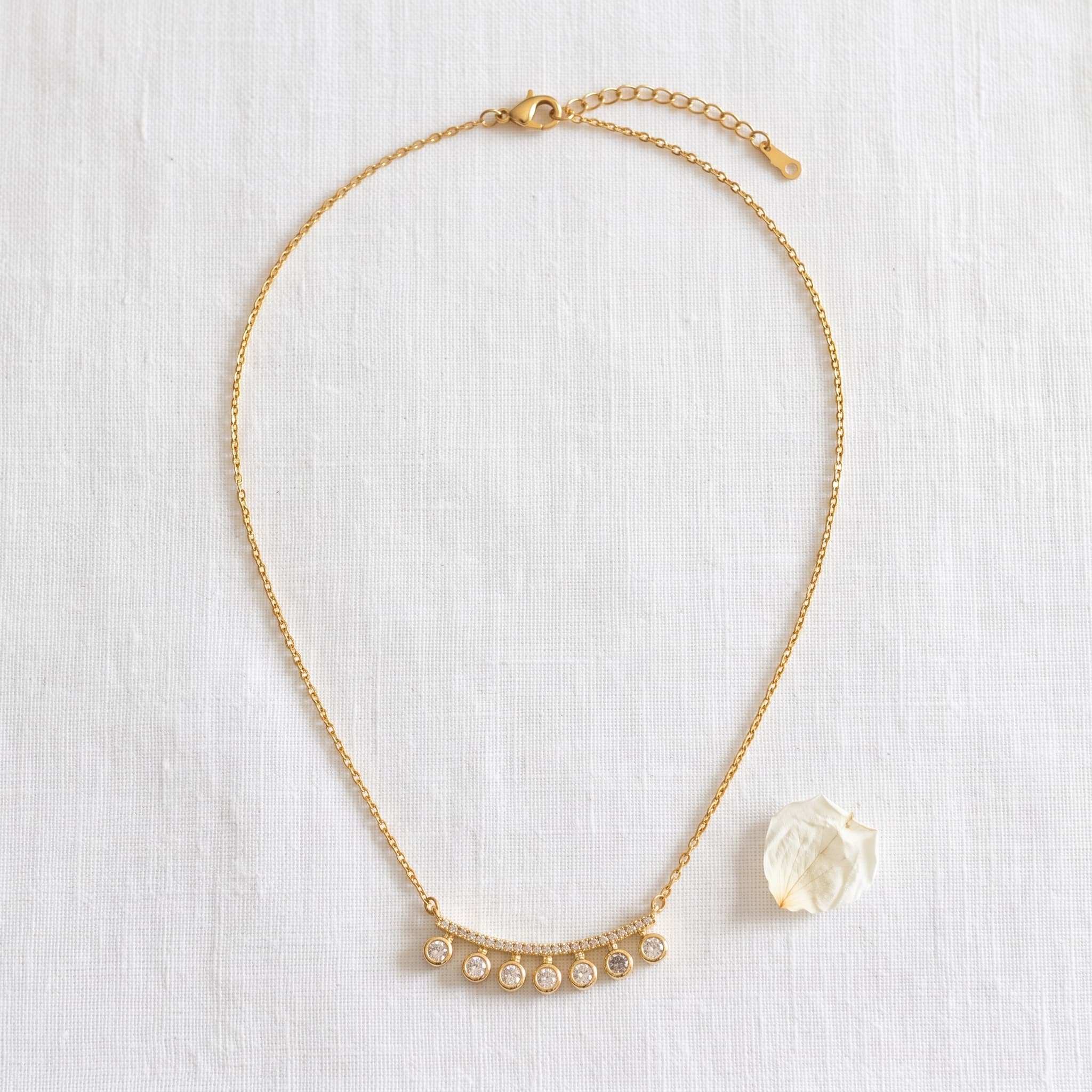 daintily beaded gold arc necklace