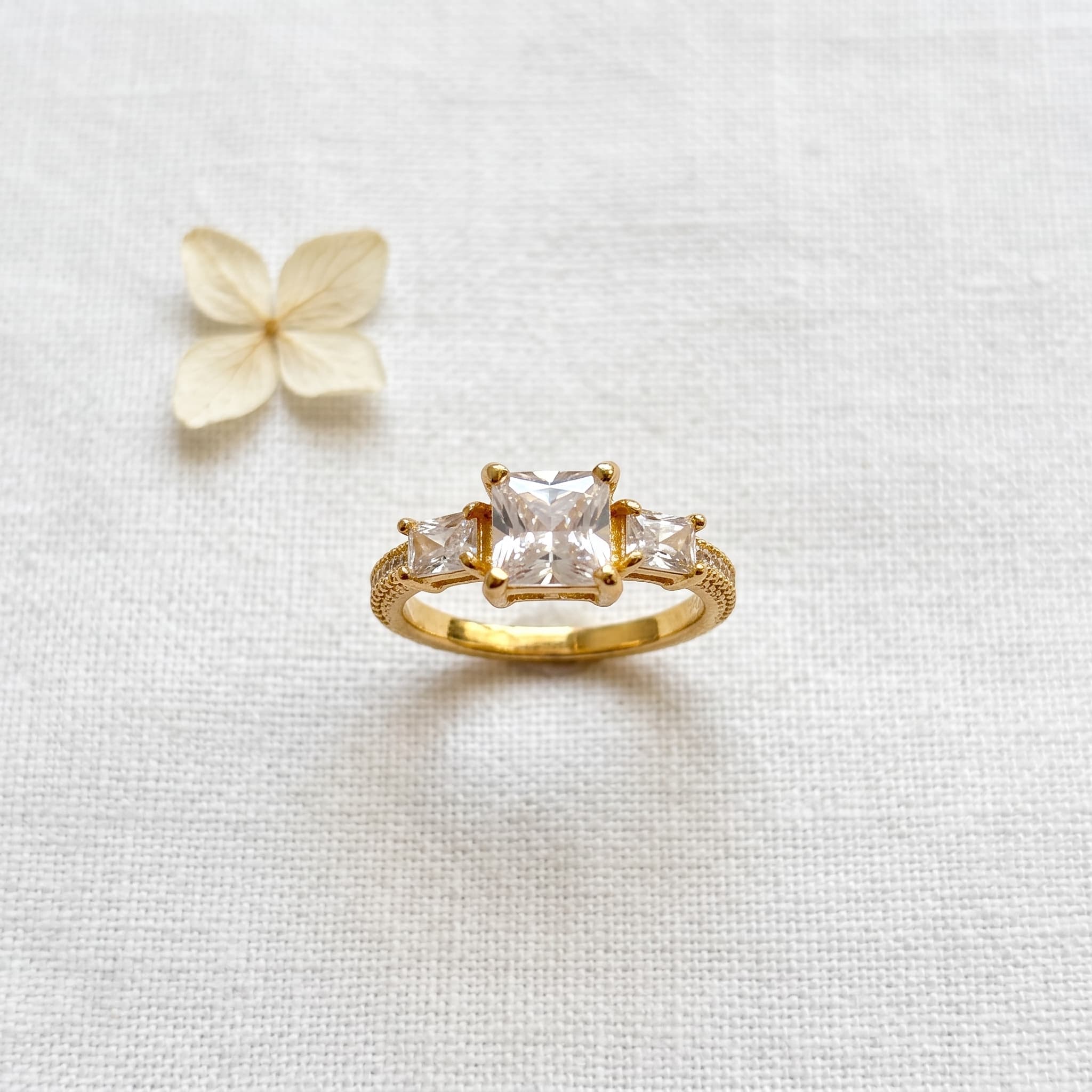three stone gold band ring