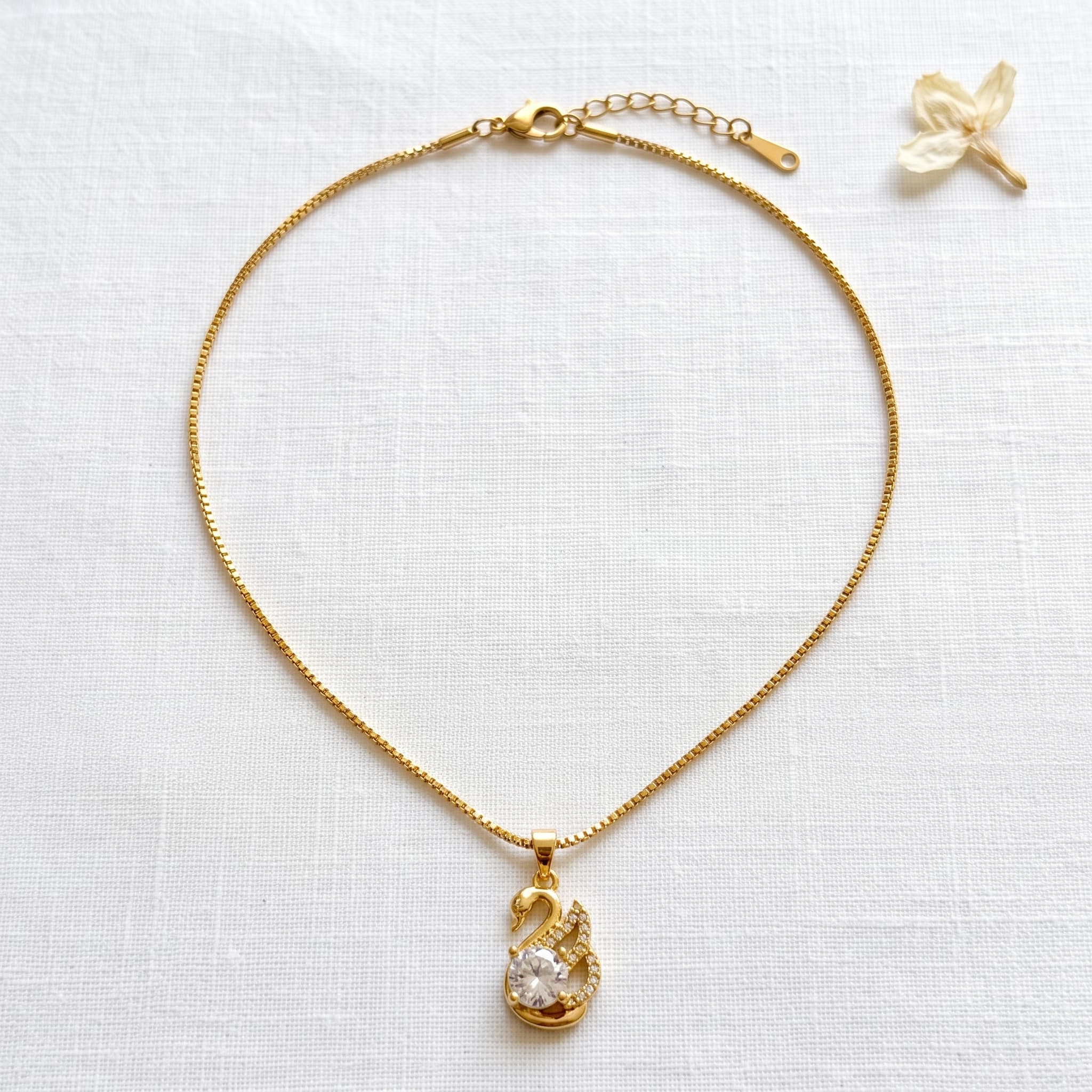 daintiest gold swan pendant