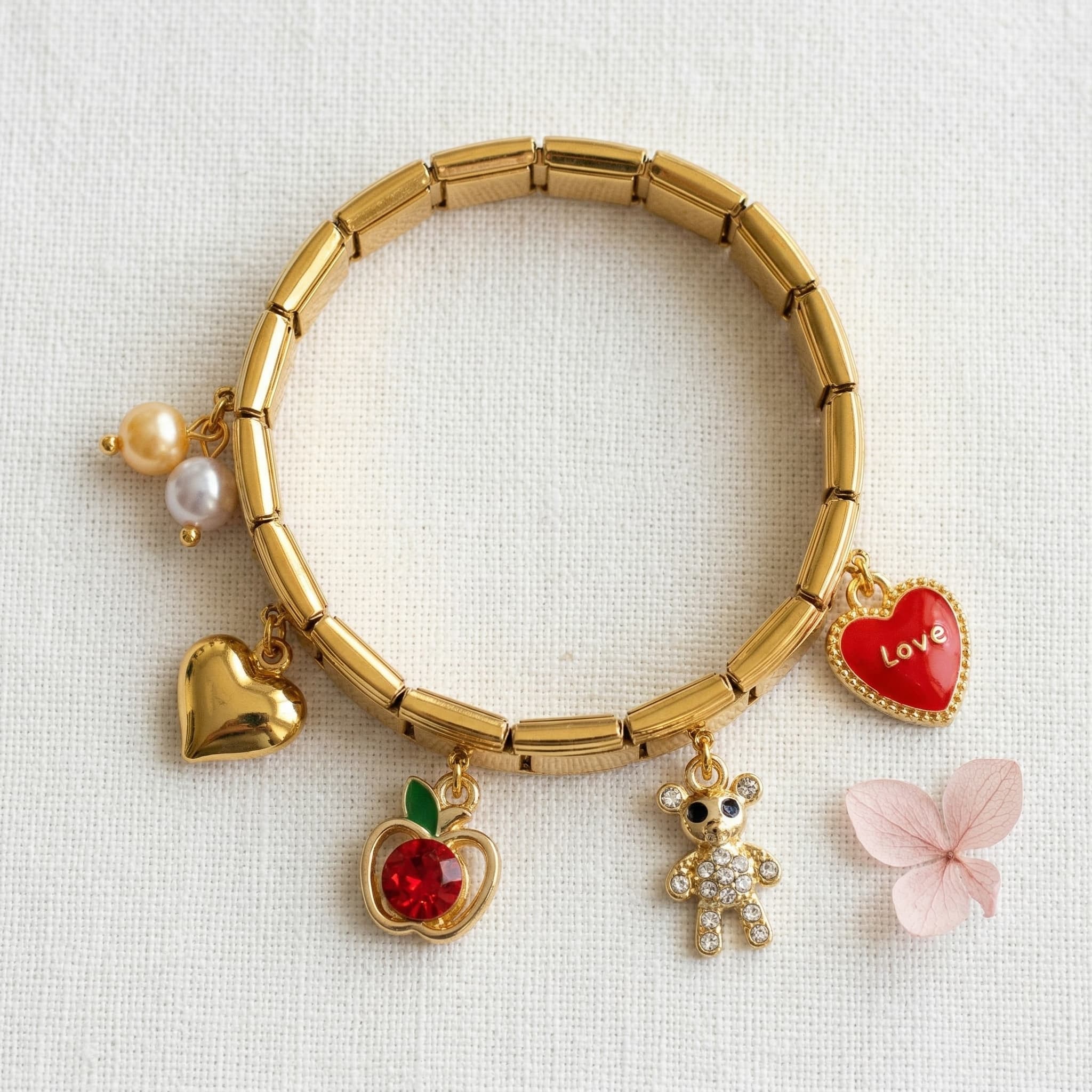 playful gold charm bracelet