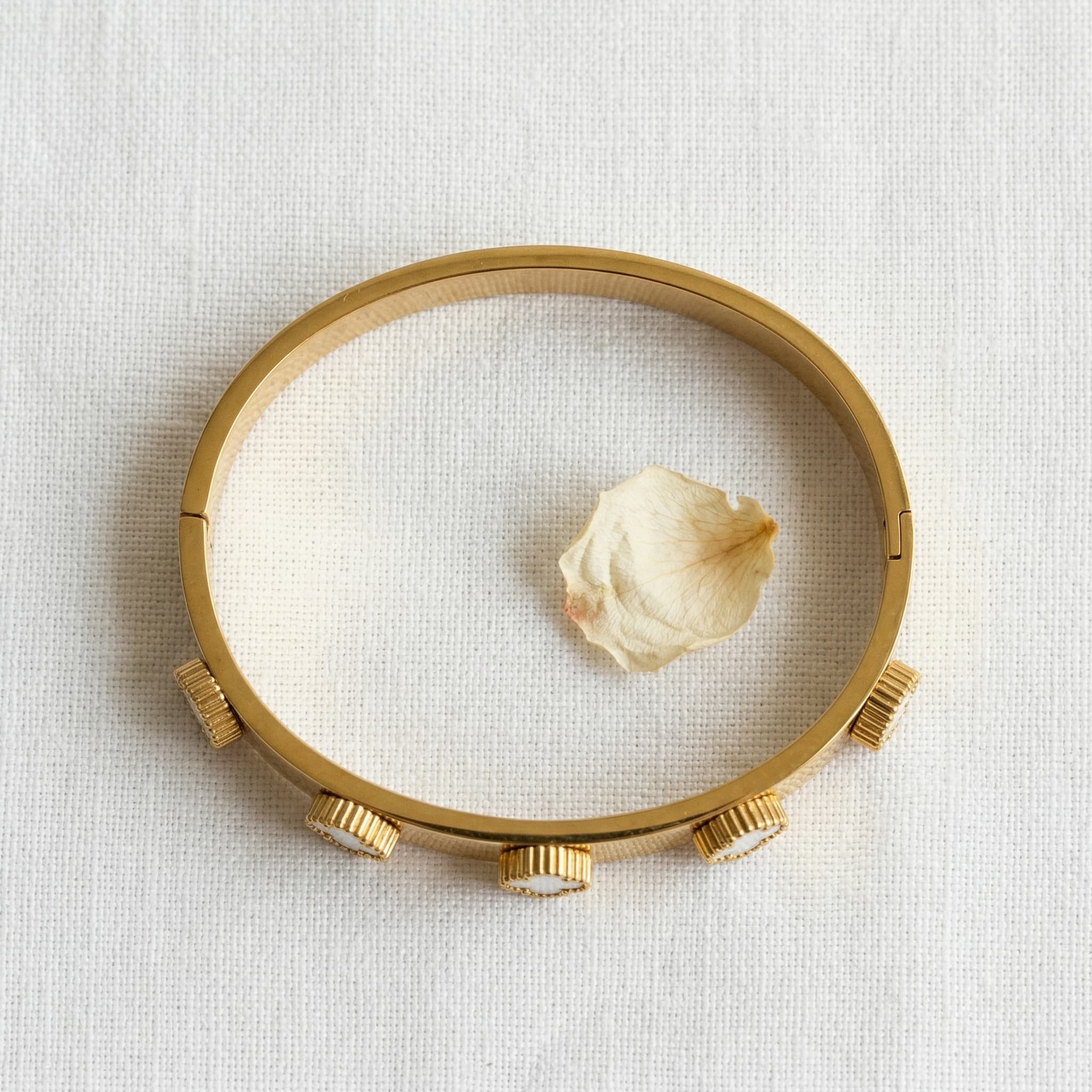 clover motif hinge bracelet