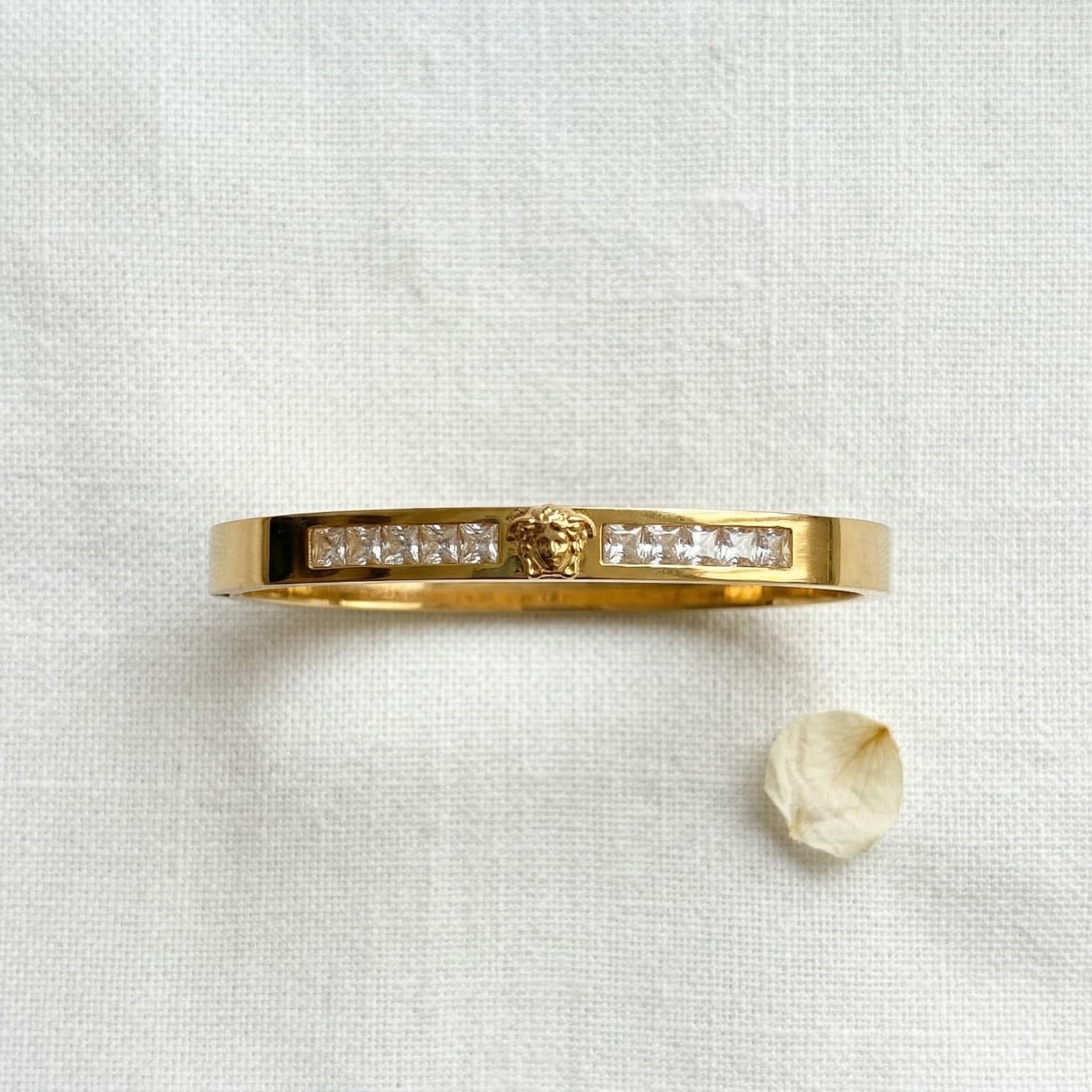 stone studded gold cuff