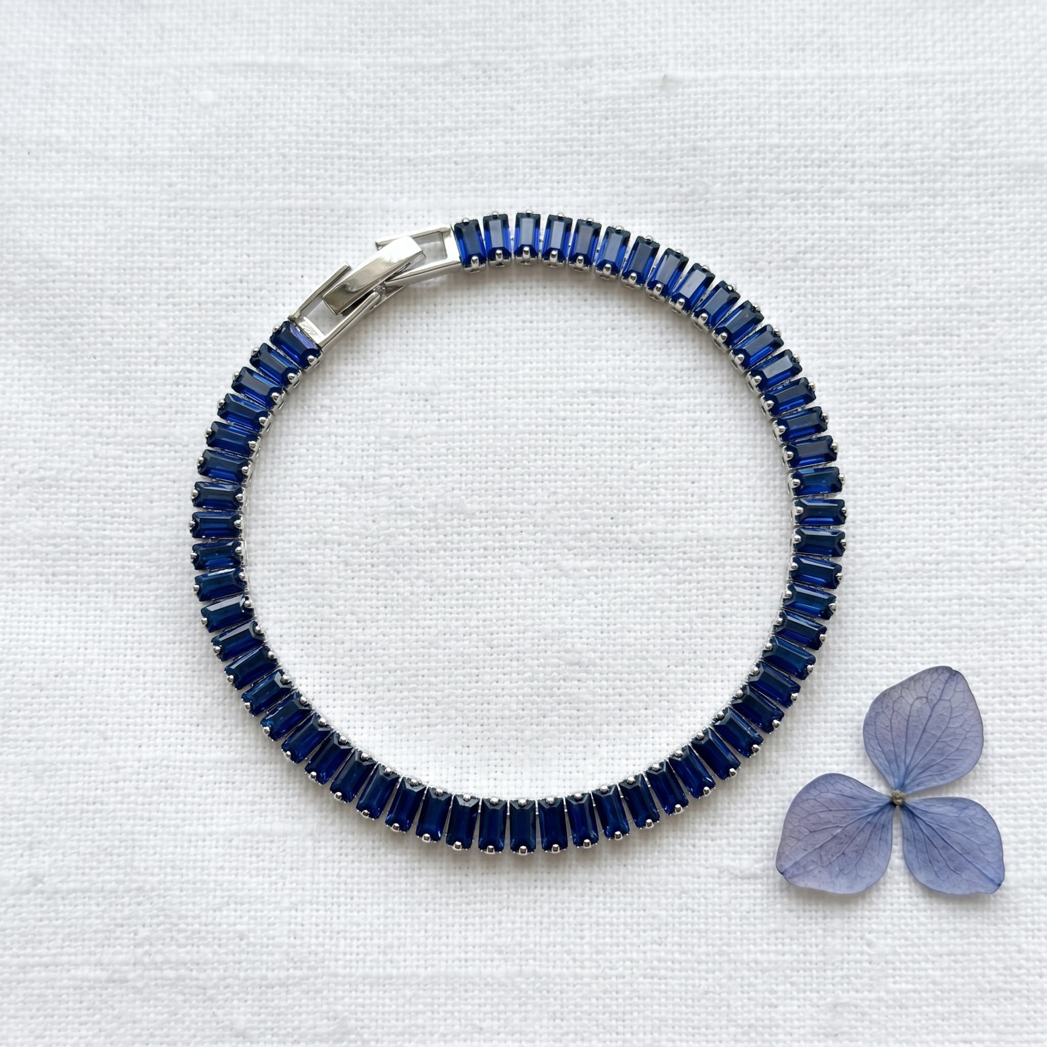 deep blue baguette tennis bracelet