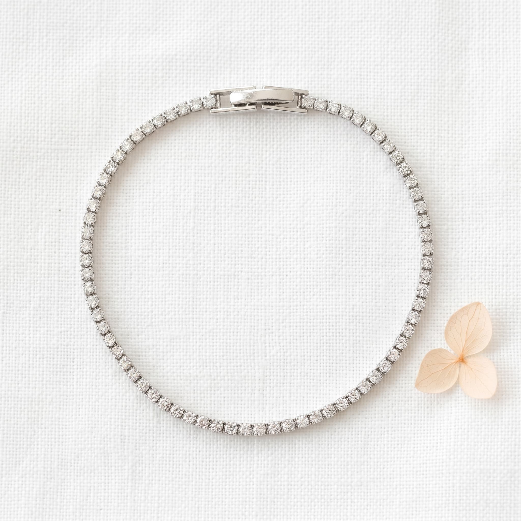 daintily sparkling silver tennis bracelet