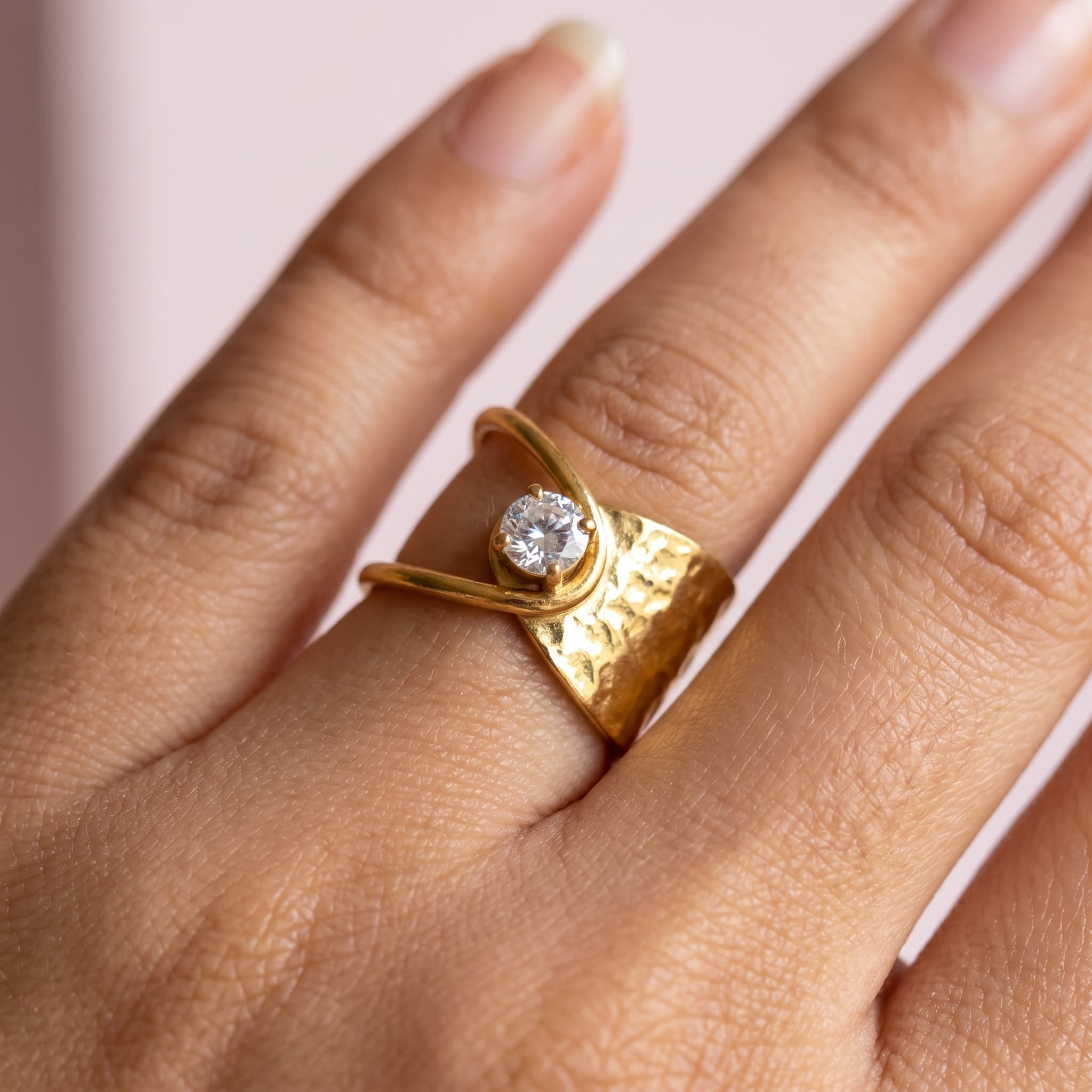 crossover solitaire gold ring