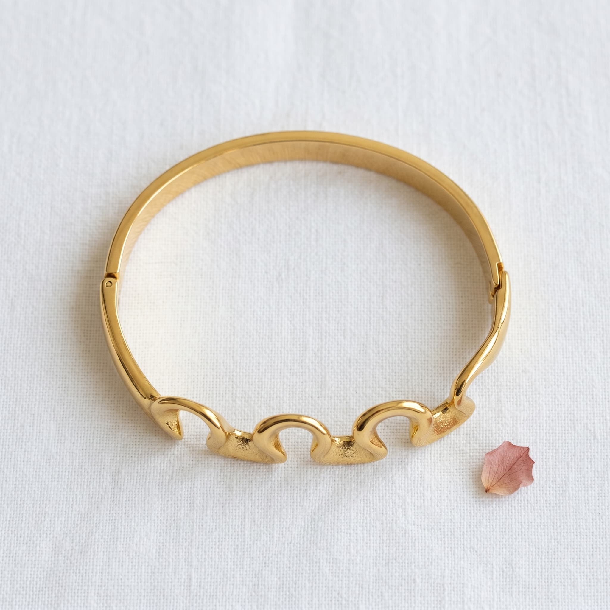 wavy golden hinge bangle